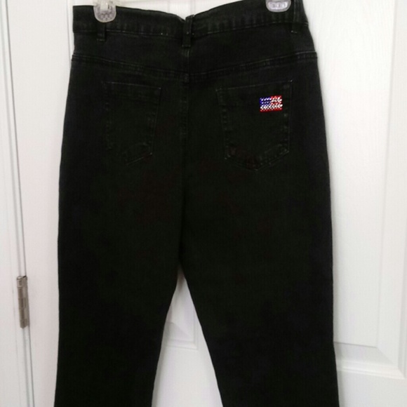 jeans with black flag on back pocket